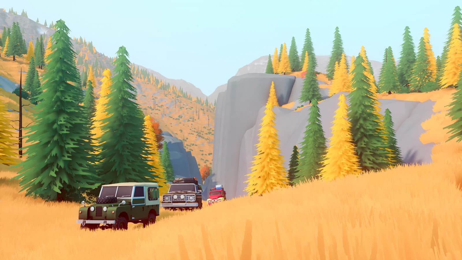 Over the Hill vehicles following an autumn forest track