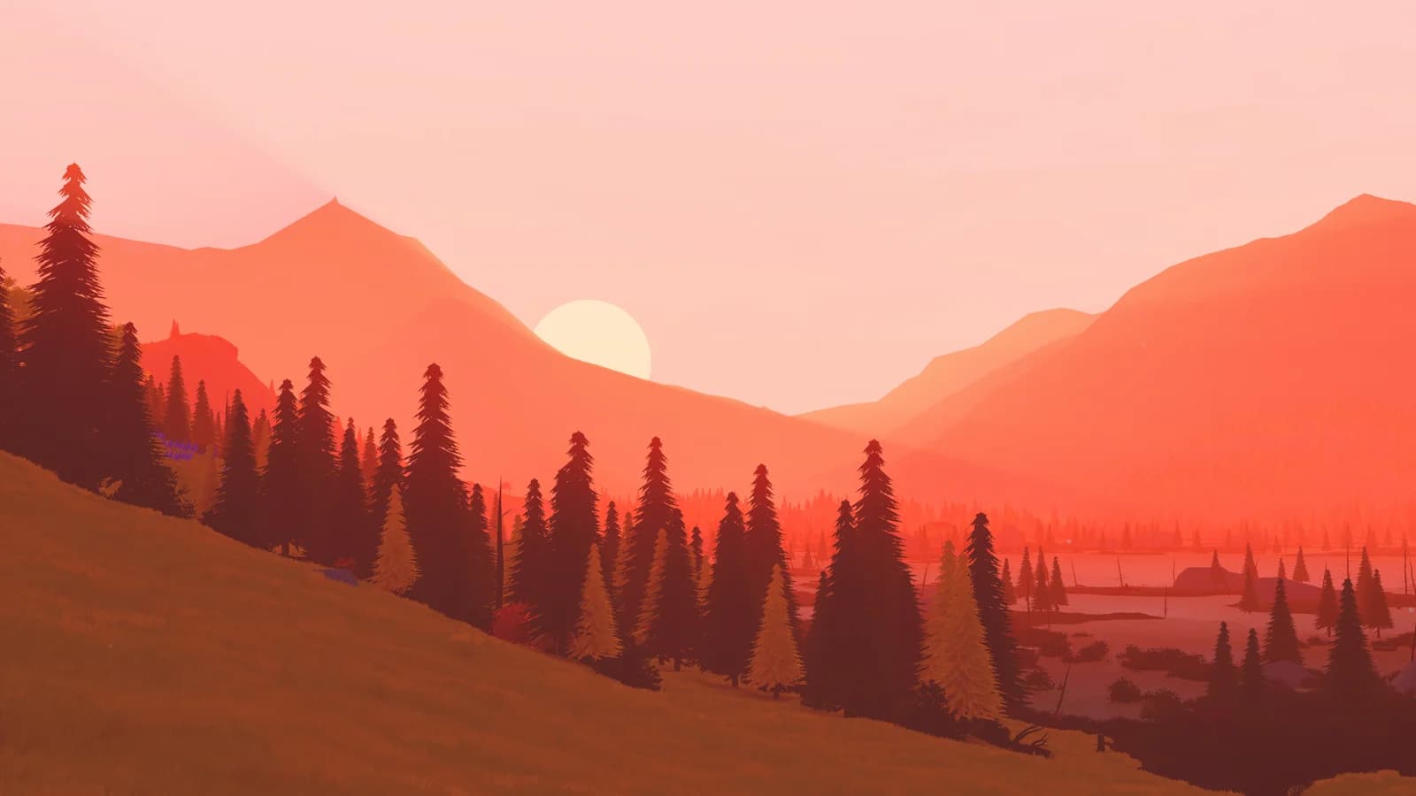 An orange sunset over the mountains and pine forests of Over the Hill